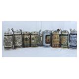 Lot of 8 steins. Pair of football and western.