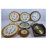 Lot of wall clocks. Bird, pioneer and baseball