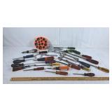 Lot of tools. Screwdrivers, wrenches, stapler and
