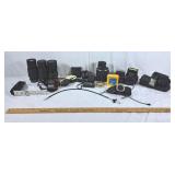 Lot of camera lenses, flashes, straps, angle