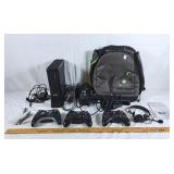 Xbox 360 slim console, travel backpack, three