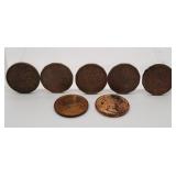 Seven Canada Pennies. Pennies are from the Years