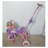 Pink and purple children's push tricycle