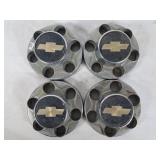Four Chevrolet Hub Caps