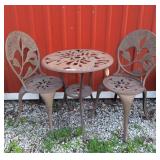 Lovely metal conversation table and 2 chairs.