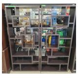 Pair of multi-tier, staggered geometric bookcases