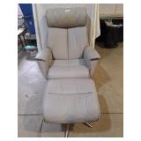 Comfort Norway light gray chair with foot stool.