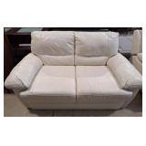 Lovely leather-like loveseat