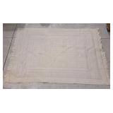 Ivory or cream-colored woven area rug - 61'lï¿½45'w