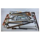 Assortment of Handsaws and Carpentery Tools.