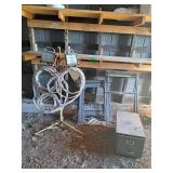 Worklight, 2 plastic sawhorses, torch hose,