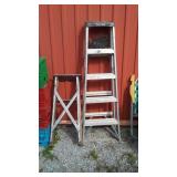 2 Ladders One Aluminum And 1 Wood