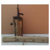 Antique Oil Pump And Wooden Beam With Hook
