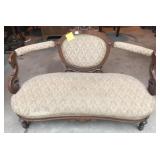 Antique walnut upholstered parlor settee