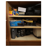 Contents of Cabinet: Camera Equipment & More