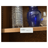 Contents of the Cabinet Featuring Vases, Pitchers & More