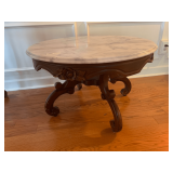 Antique Victorian Rococo Style Parlor Table Featuring a Marble Top & Carved Wooden Apron