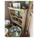 White Wooden Shelving Unit with Assorted Decorativ