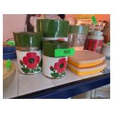 Metal Canisters with Green Lids and Floral Design