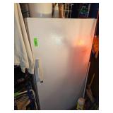 White Upright Freezer with Unknown Functionality