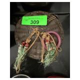 Handwoven Round Basket with Decorative Tassels and