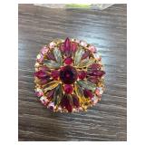 Gold-Tone Brooch with Red, Clear, and Iridescent S