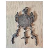 Metal Pendant Featuring Religious and Decorative M