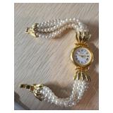 Monet Gold-Tone Pearl Band Quartz Watch with Stain