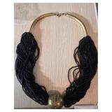 Beaded Necklace With Brass Detailing and Decorativ