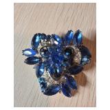 Silver-Tone Brooch with Blue Rhinestones and Leaf
