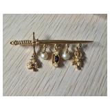 Gold-Tone Sword Brooch with Dangling Charms