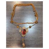 Gold-Tone Necklace with Red and Amber Glass Accent