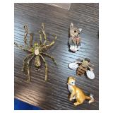 Four Animal-Themed Brooches
