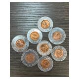 Eight Encased Pennies with Various Inscriptions