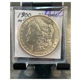 1900 Morgan Silver Dollar in About Uncirculated Co