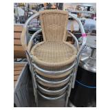 Four Aluminum and Wicker Stacking Chairs