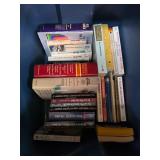 Books and VHS Tapes in Storage Bin