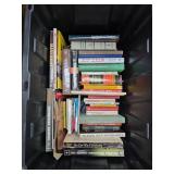 Plastic Storage Bin Filled With Assorted Books on