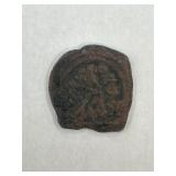 Ancient Bronze Coin with Figure Motif