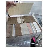 Box of Decorative Paper Samples with Plastic Stora