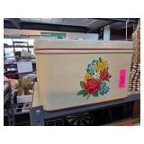 Cream-Colored Metal Tin with Floral Design and Red