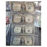 Four 1935 Series Blue Seal $1 Silver Certificates