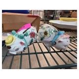 Two Ceramic Pig Figurines with Floral Decorations
