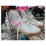 Nike Mid-Top Sneakers with Pink Swoosh Design