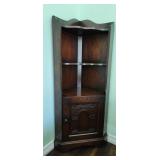 Dark Wood Corner Shelf with Cabinet and Carved Det