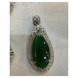 Jade Pendant with Diamond Accents and Ornate Metal