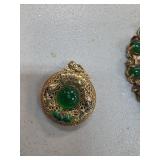Gold-Tone Pendant with Green Jade Cabochon and Ena
