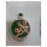 Gold and Jade Pendant with Bird and Branch Design