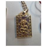 Gold Pendant Featuring Chinese Dragon Motif with P