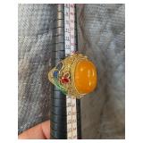 Ring with Amber-Colored Jade and Enamel Detailing